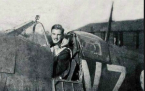 John Gillespie Magee, Jr seated in his Spitfire